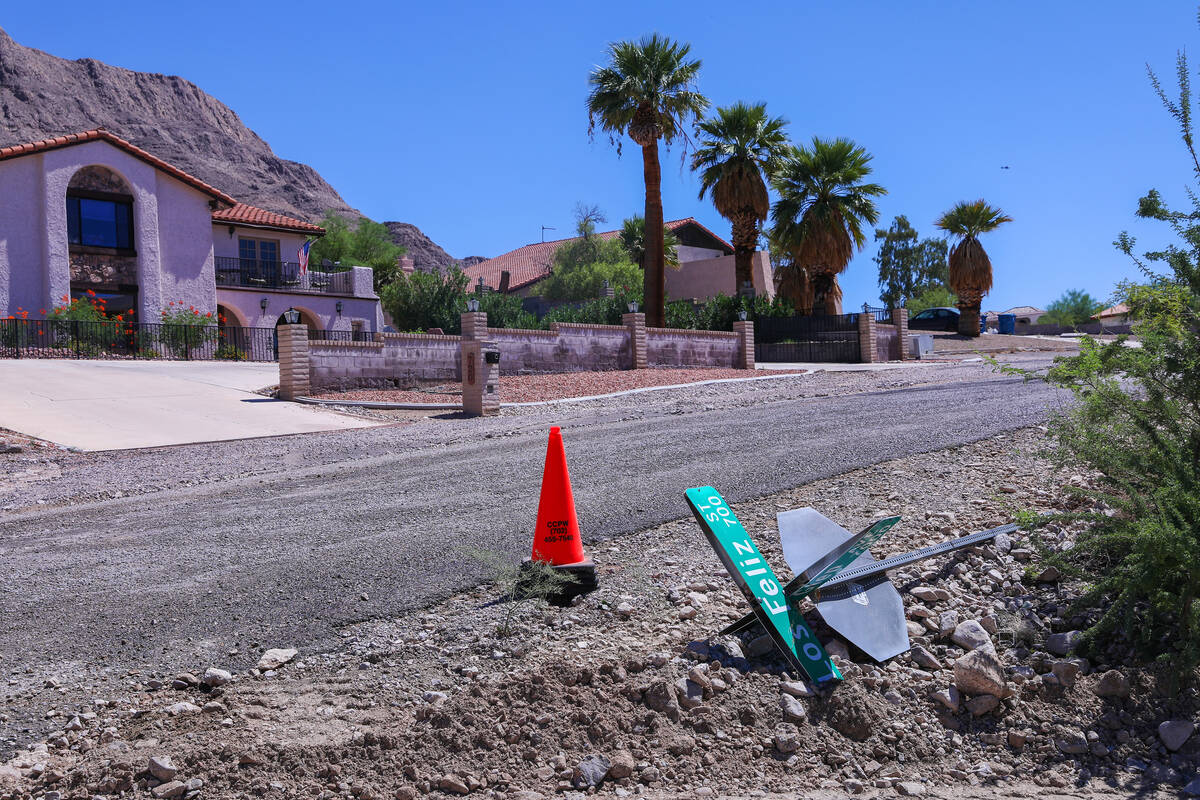 A washed-away street sign in the aftermath of the damaging flash floods that engulfed the Las V ...