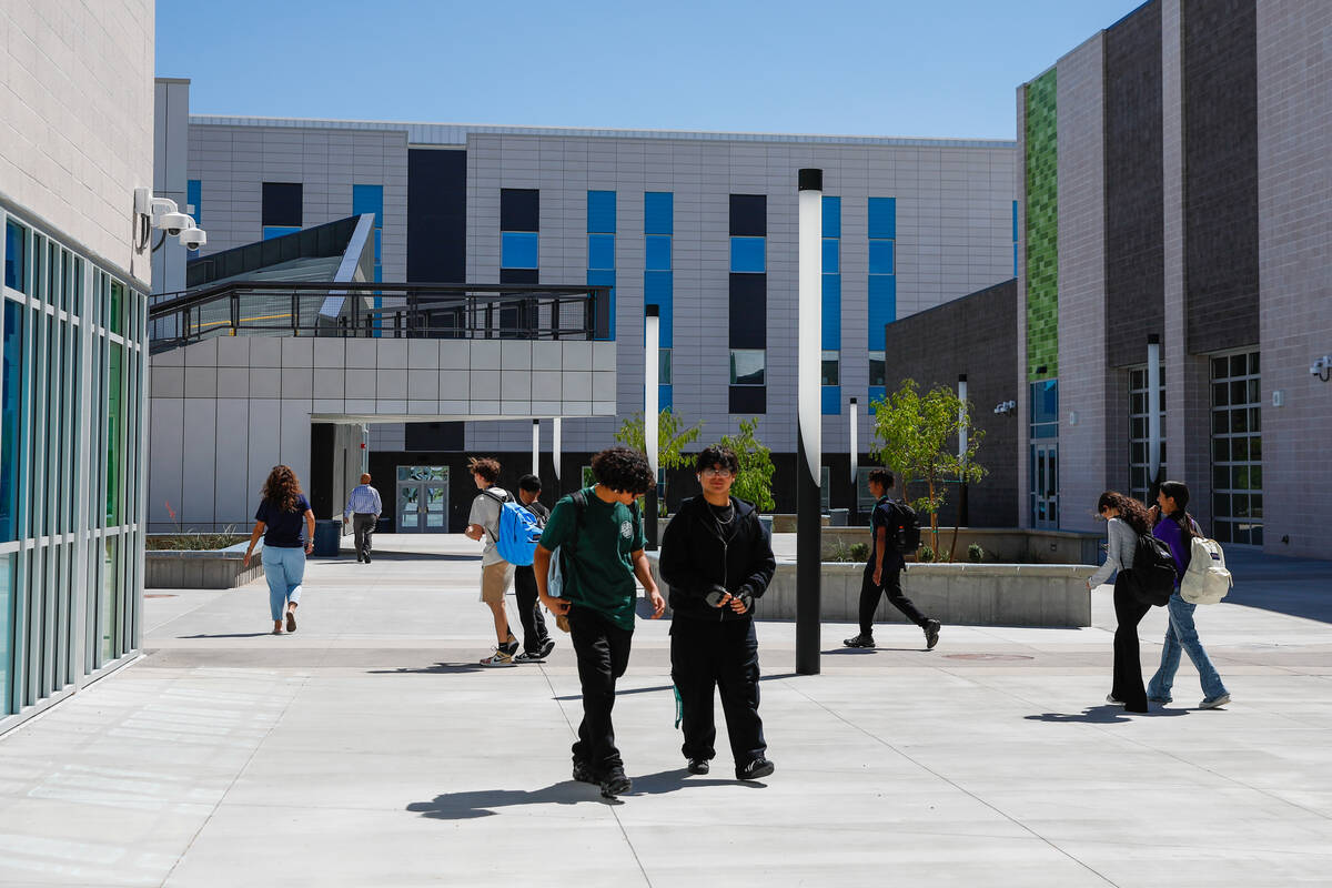 Northeast Career and Technical Academy students walk about their new campus on Dorrell Lane in ...