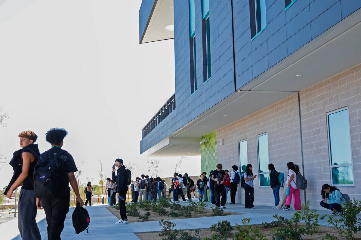 Northeast Career and Technical Academy students walk out of their new campus on Dorrell Lane in ...