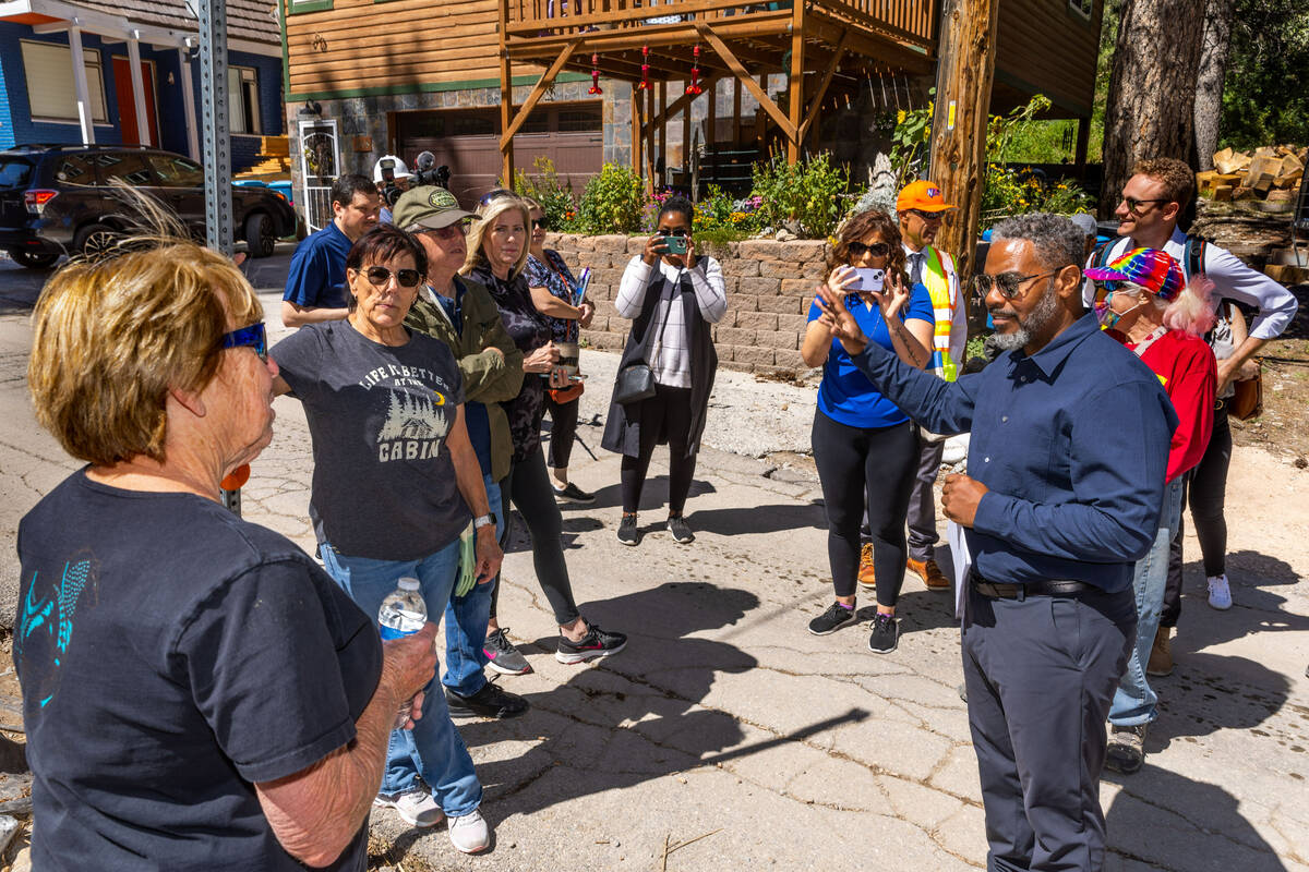 Congressman Steven Horsford, right, talks with residents as he and other officials tour Old Tow ...