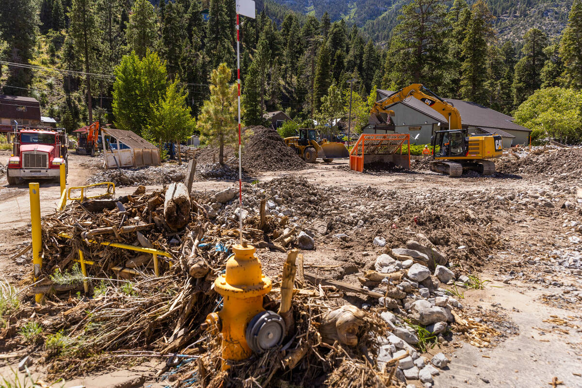 Debris is still being cleared in Old Town near the library on Mount Charleston on Wednesday, Se ...