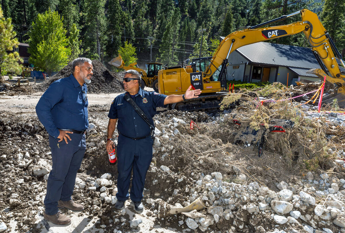 Congressman Steven Horsford, left, talks with Mt. Charleston Fire District Chief Jorge Gonzalez ...