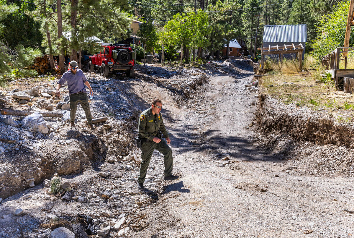 Aspen Avenue in Old Town is destroyed but now navigable on Mount Charleston on Wednesday, Sept. ...