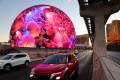 Sphere fans dodge traffic, find parking for best light show views — PHOTOS