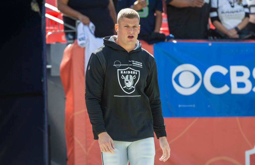 Raiders defensive end Carl Nassib (94) takes the field to warm up before an NFL football game a ...