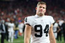 Raiders defensive end Carl Nassib (94) walks off the field after his team’s loss against the ...