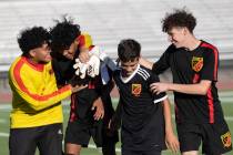 Las Vegas players celebrate their win in a boys high school soccer game against Sunrise Mountai ...