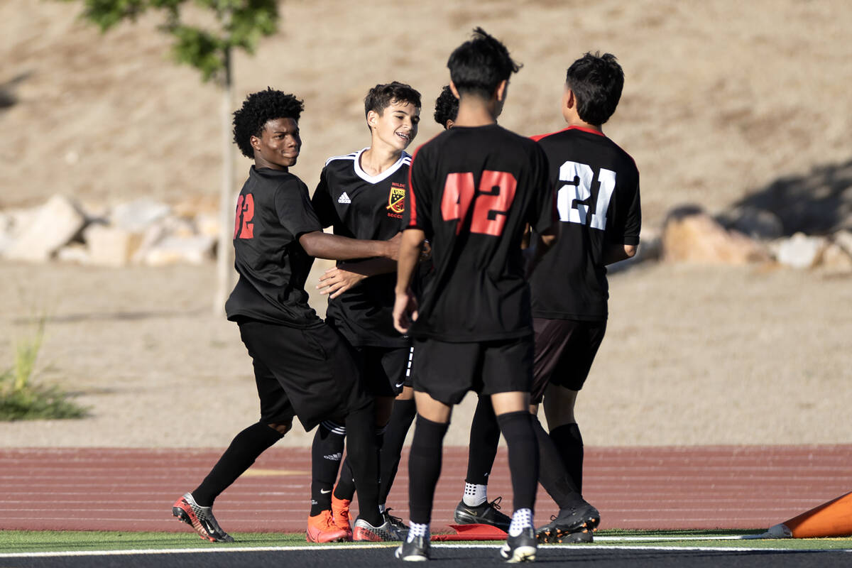 Las Vegas rallies around Las Vegas' Bautista Silva, second from left, after he scored a goal du ...