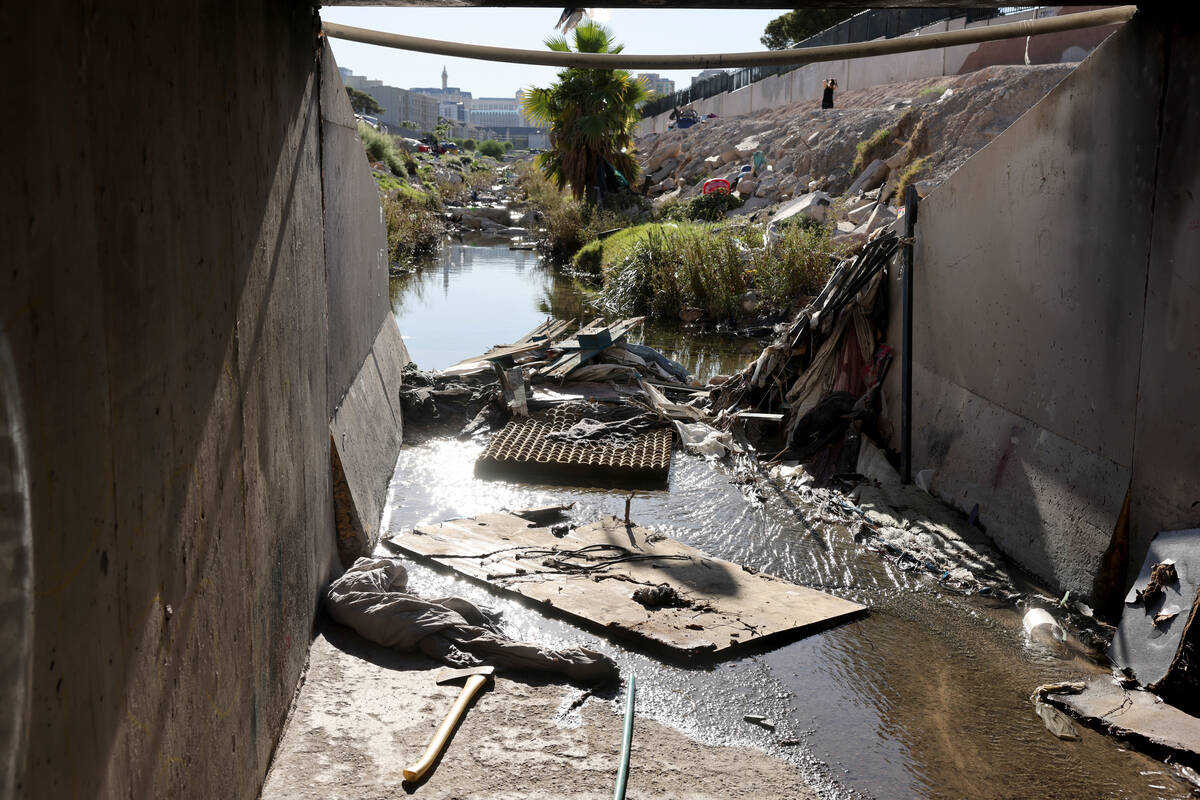 People camp along the Tropicana Wash near University Center Drive east of the Strip in Las Vega ...