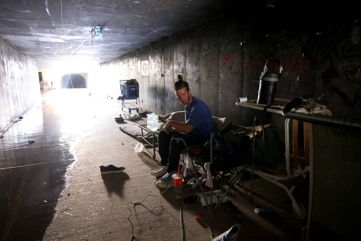 Paul, who declined to give his last name, camps in a flood control tunnel under University Cent ...