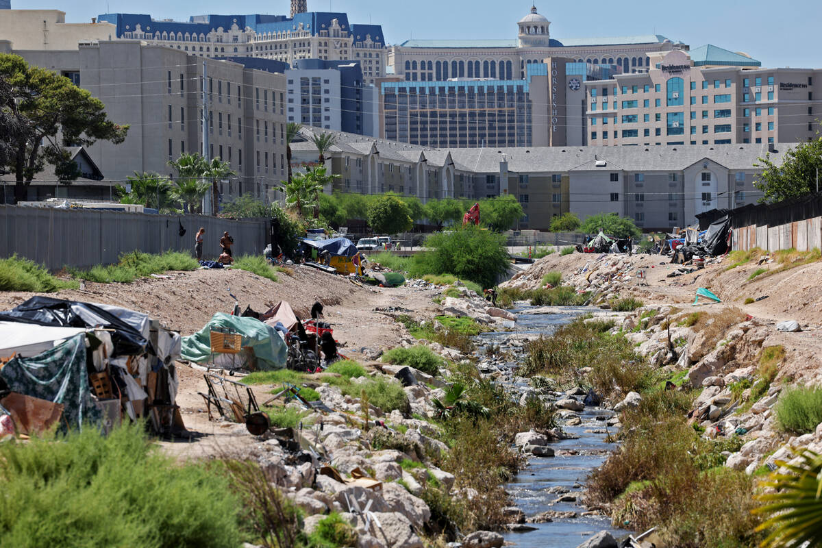 People camp along the Tropicana Wash near University Center Drive east of the Strip in Las Vega ...