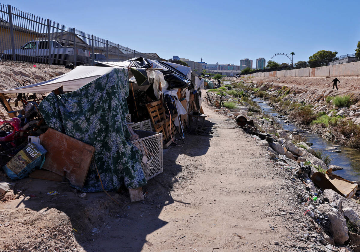 People camp along the Tropicana Wash near University Center Drive east of the Strip in Las Vega ...