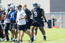 Raiders defensive end Tyree Wilson (9) joins the huddle during team practice on Thursday, Sept. ...