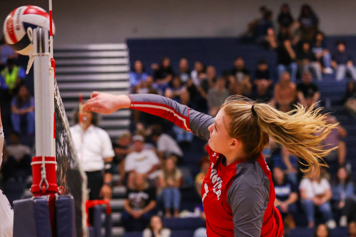 Arbor View’s Madison Garvin (7) spikes the ball during a volleyball game between Centenn ...