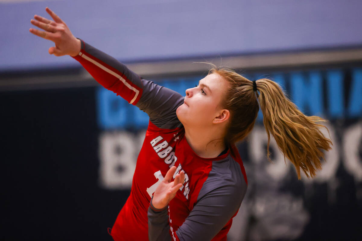 Arbor View’s Madison Garvin (7) spikes the ball during a volleyball game between Centenn ...