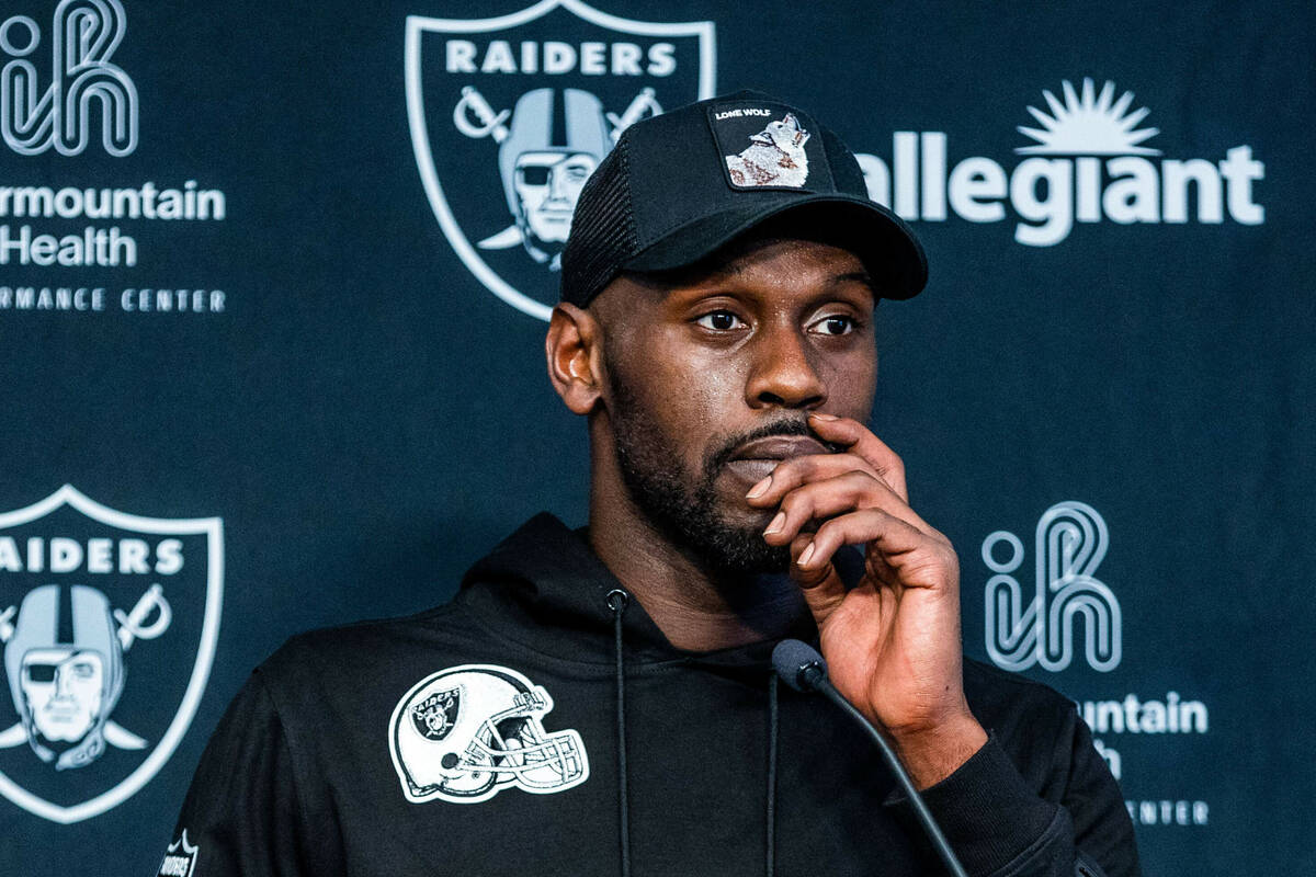 Raiders defensive end Chandler Jones (55) considers an answer as he talks with the media during ...