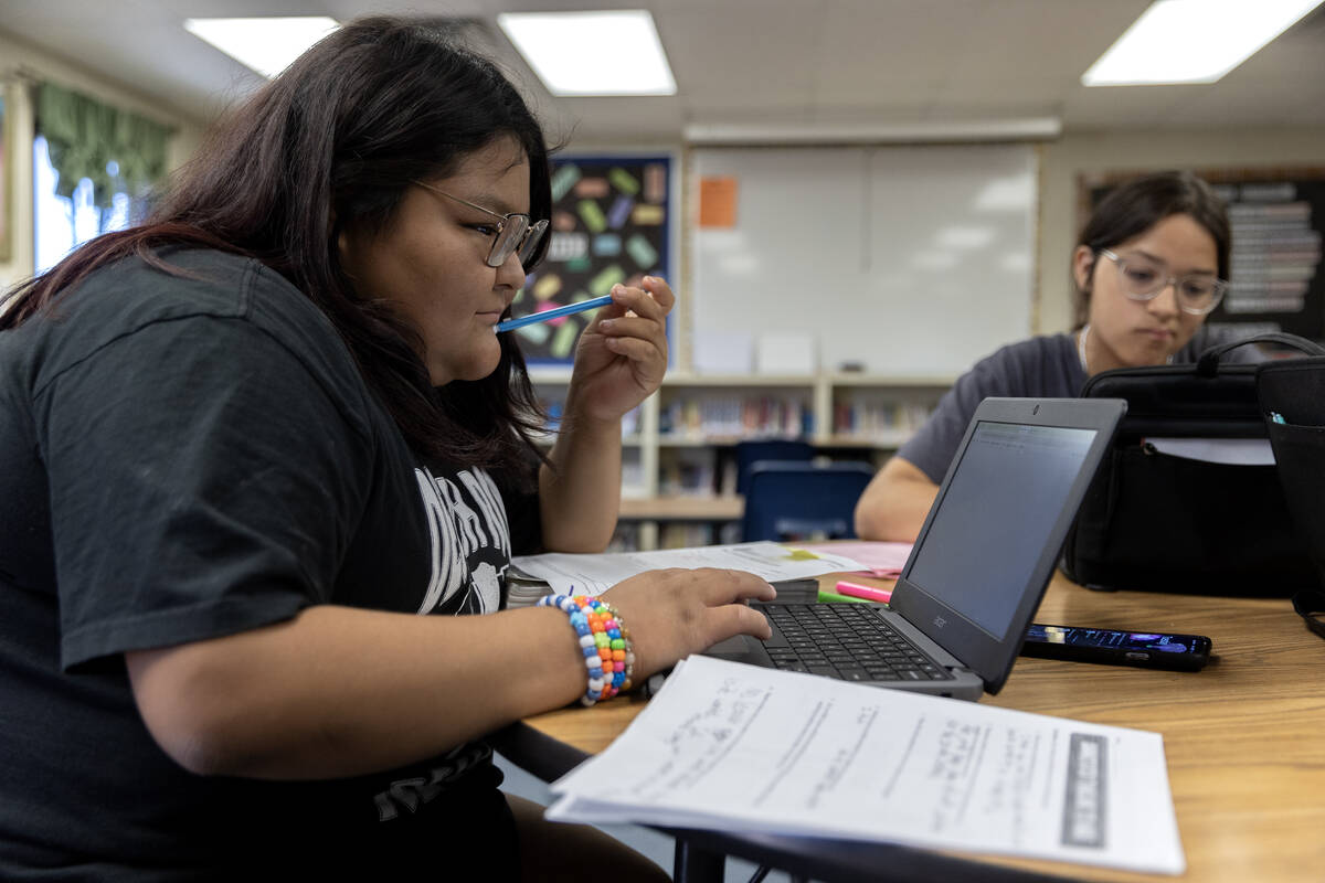 Aiyana Jim, a junior at Moapa Valley High School, does her homework at the Moapa Educational Su ...