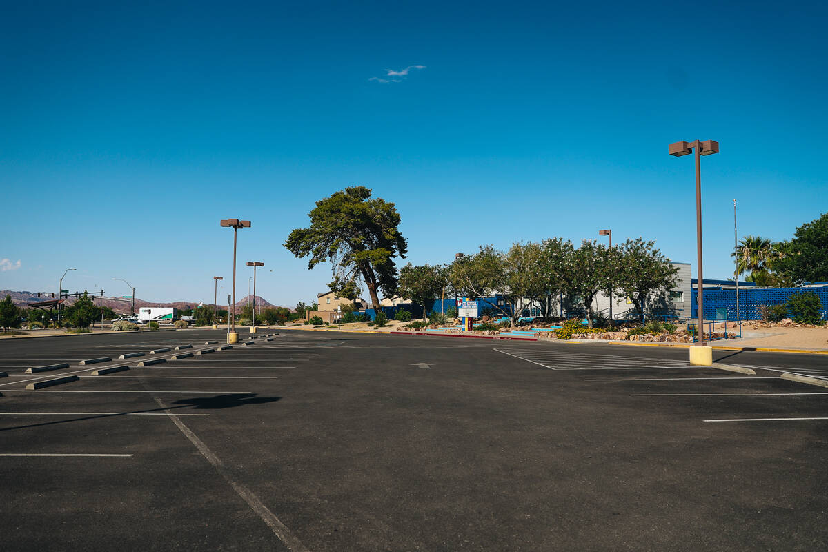 The C.T. Sewell Elementary School parking lot sits empty after it was closed for the day becaus ...