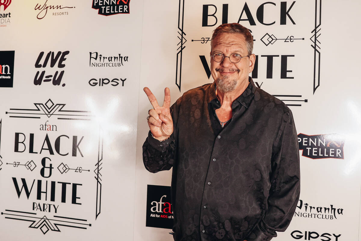 Magician Penn Jillette poses for photographs during the annual AFAN Black and White Party at Pa ...