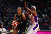 Las Vegas Aces forward A'ja Wilson (22) prepares to take a shot against Los Angeles Sparks forw ...