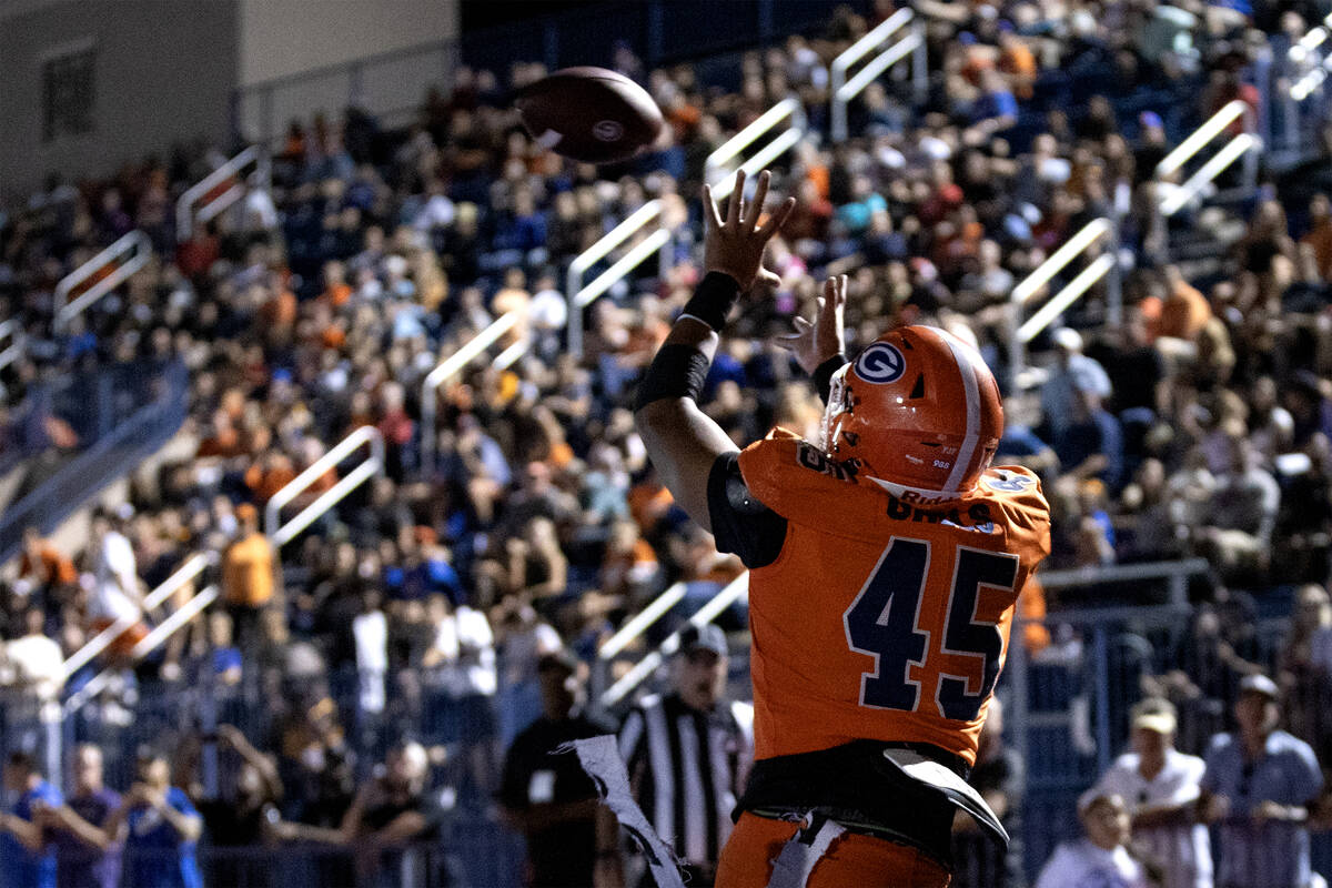 Bishop Gorman tight end Eli Yamauchi (45) reaches to catch a touchdown pass during the first ha ...
