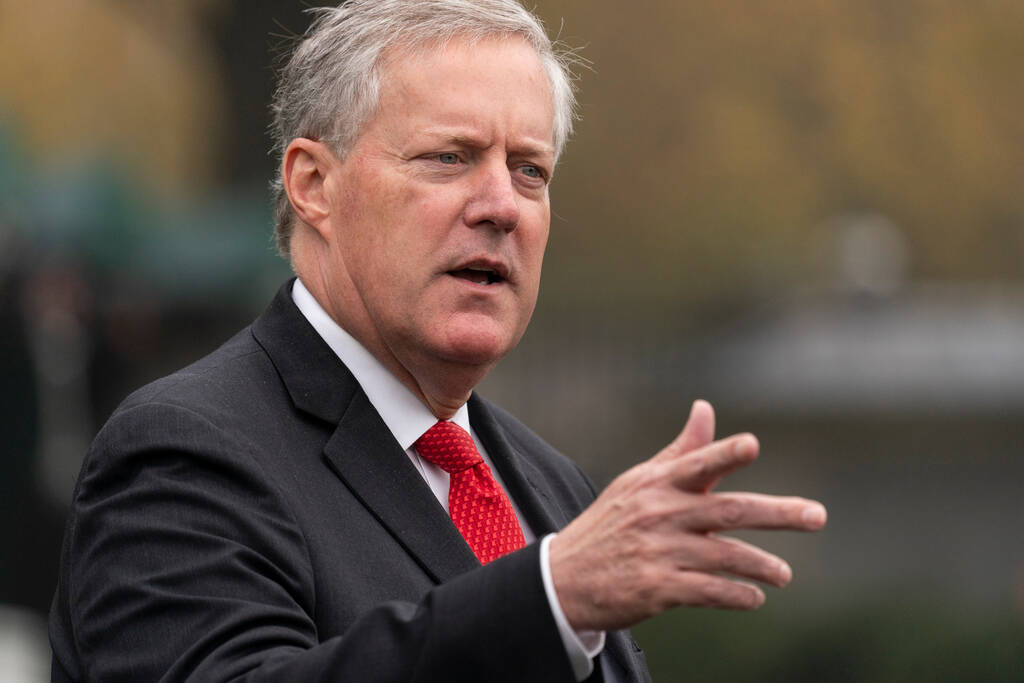 White House chief of staff Mark Meadows speaks with reporters at the White House, Oct. 21, 2020 ...