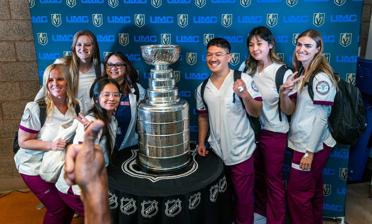 Roseman University of Health Sciences students pose with the Stanley Cup during a visit to UMC ...