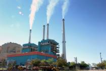 FILE - Gas emissions rises from a coal-burning power plant in Colstrip, Mont., July 1, 2013. Yo ...