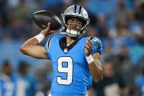 Carolina Panthers quarterback Bryce Young passes against the Detroit Lions during the first hal ...