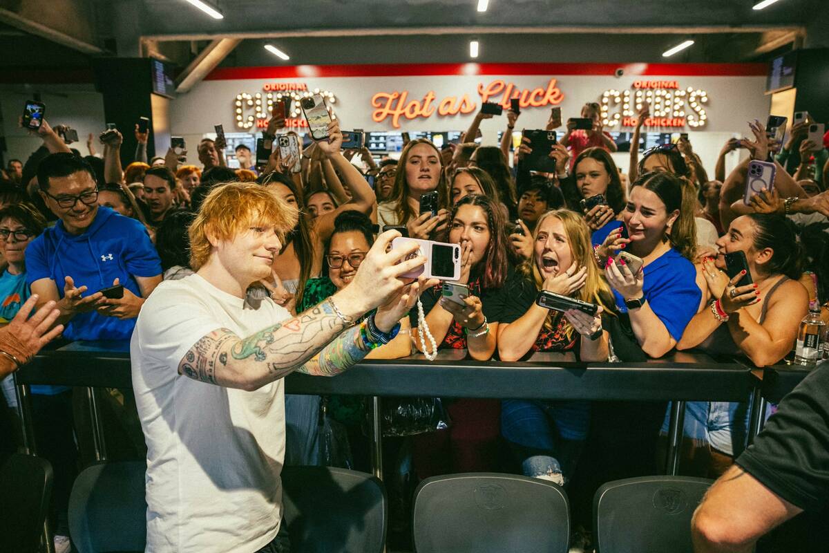 Ed Sheeran poses with fans after announcing his "Mathematics" tour stop at Allegiant Stadium ha ...