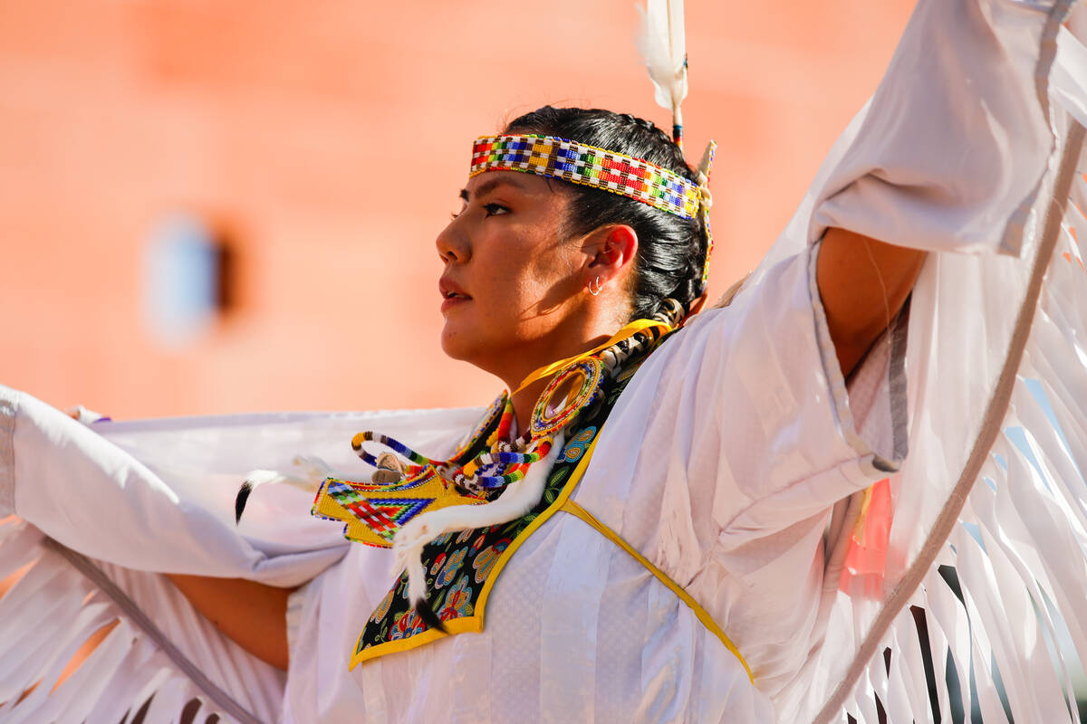 A member of the Las Vegas Native Youth Dancers performs at the Communities United, Raising The ...