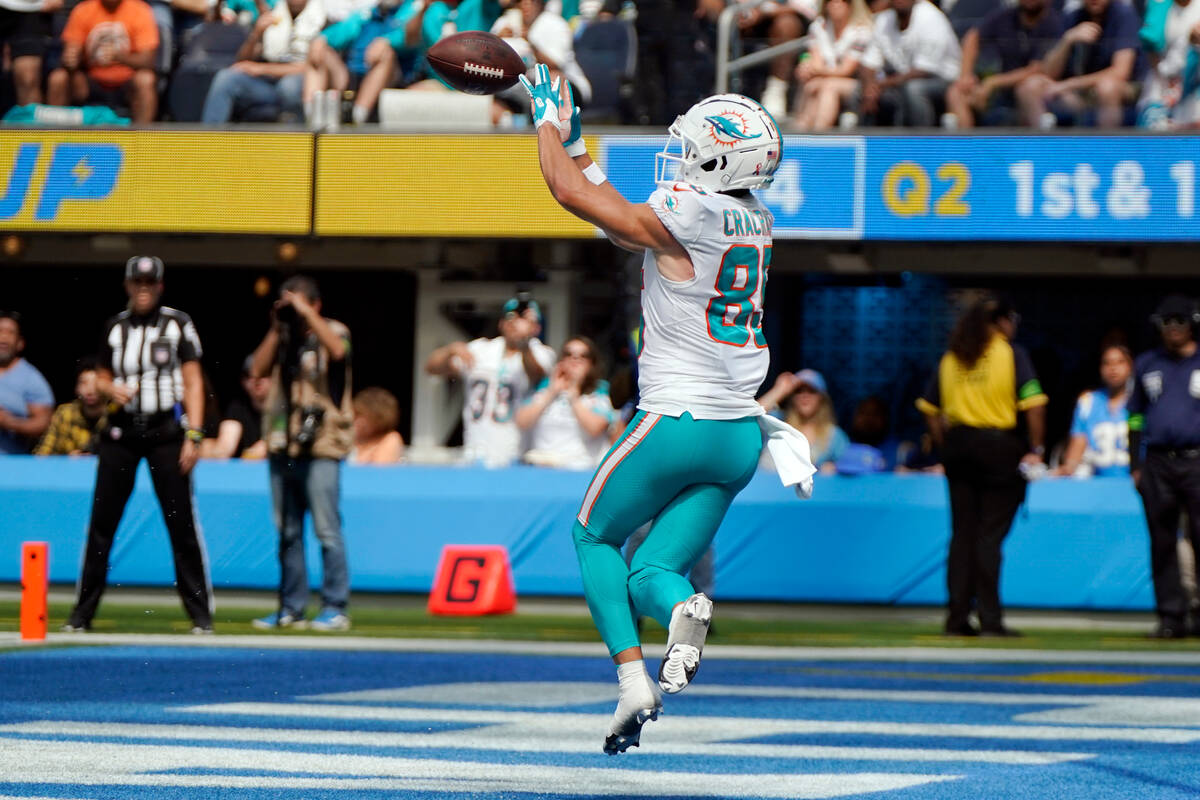 Miami Dolphins wide receiver River Cracraft catches a touchdown during the first half of an NFL ...