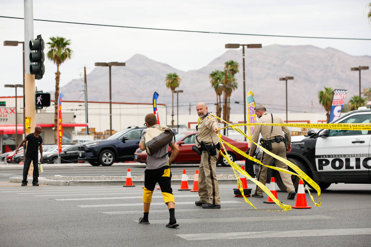 Police block of south bound Fremont Street in response to a shooting at a Circle K on the corne ...