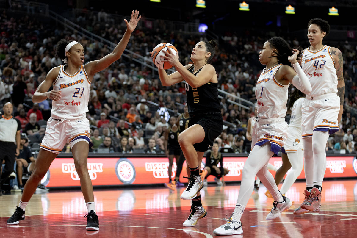 Las Vegas Aces guard Kelsey Plum (10) shoots against Phoenix Mercury forward Brianna Turner (21 ...