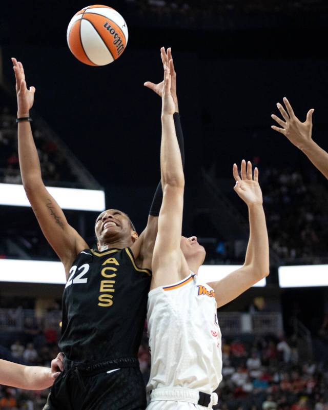 Las Vegas Aces forward A'ja Wilson (22) jumps for a rebound against Phoenix Mercury guard Ashle ...