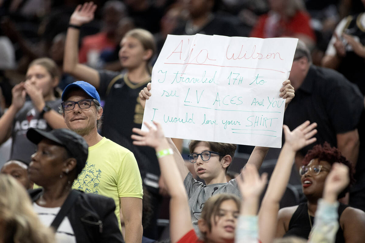A Las Vegas Aces fan holds up a sign for Aces forward A'ja Wilson during the first half of a WN ...