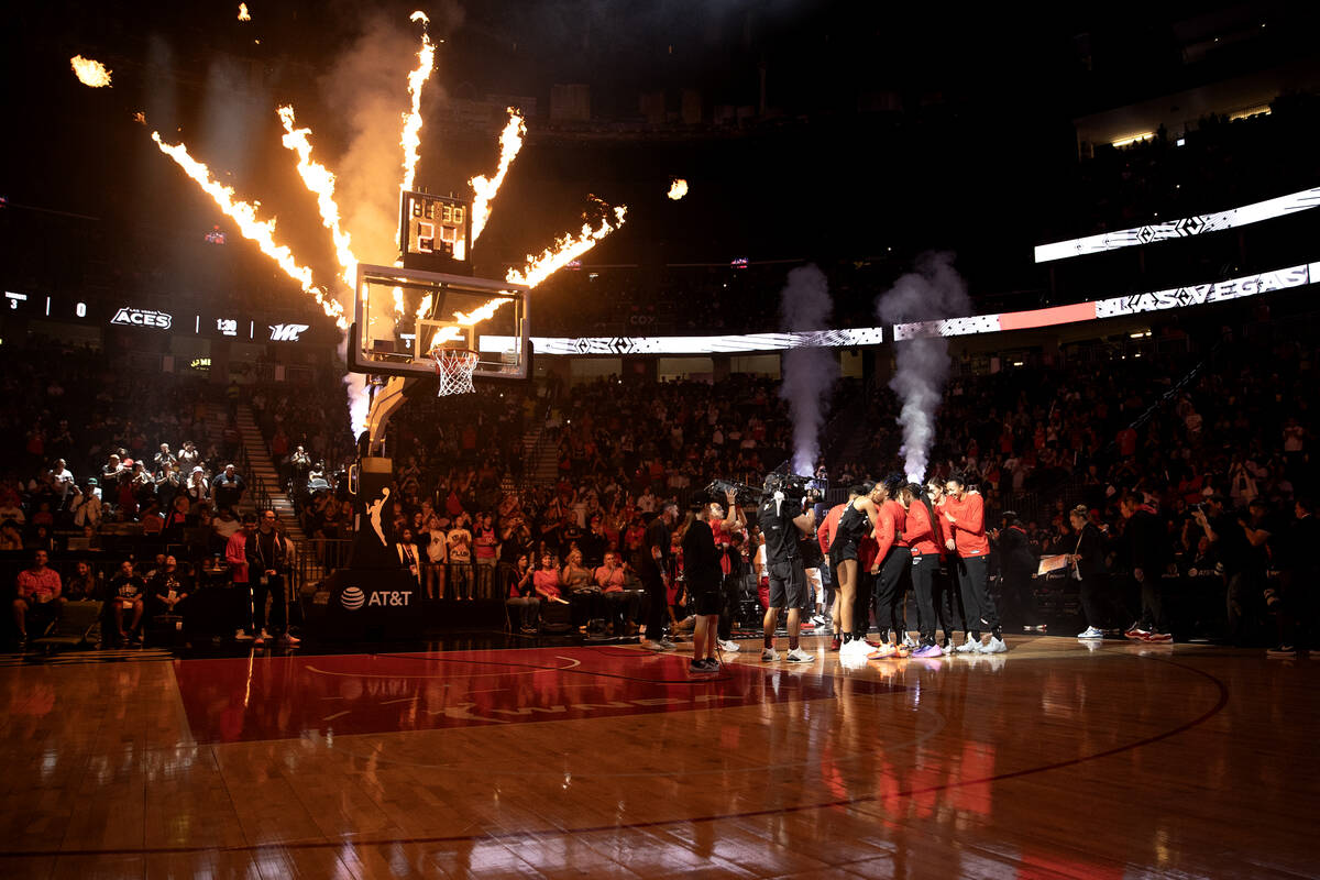 The Las Vegas Aces gather before a WNBA basketball game against the Phoenix Mercury at T-Mobile ...