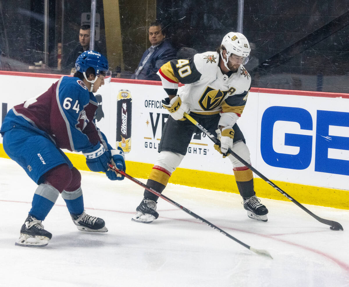 Golden Knights prospect defenseman Lukas Cormier (40) and Colorado Avalanche Loan Losing (64) c ...