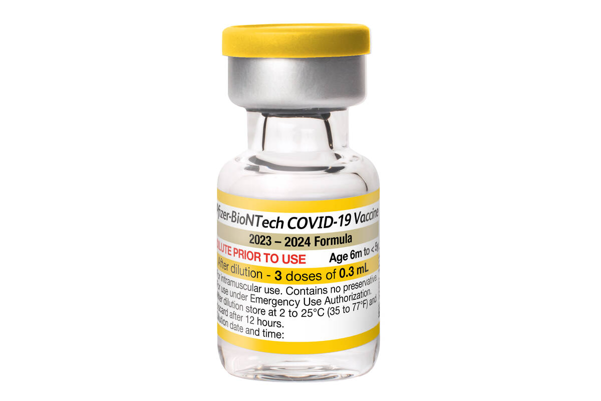 This photo provided by Pfizer shows a multi-dose vial of the company's updated COVID vaccine fo ...