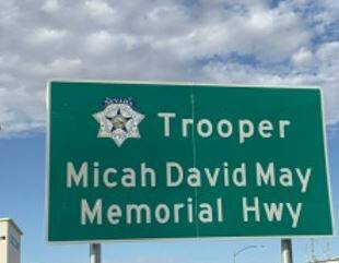 A freeway sign honoring fallen Nevada Highway Patrol trooper Micah May seen in Interstate 15 ne ...
