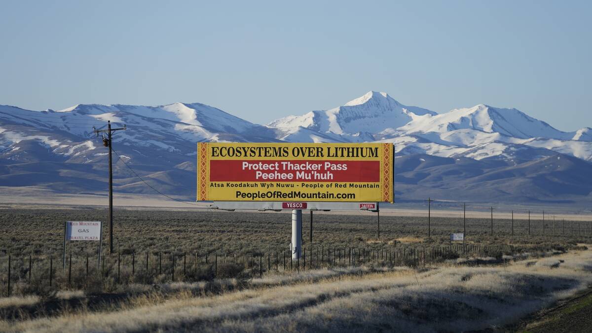 A billboard displays "Protect Thacker Pass" near the Fort McDermitt Paiute-Shoshone Indian Rese ...