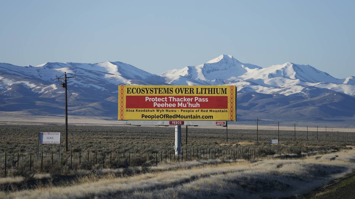 A billboard displays "Protect Thacker Pass" near the Fort McDermitt Paiute-Shoshone Indian Rese ...