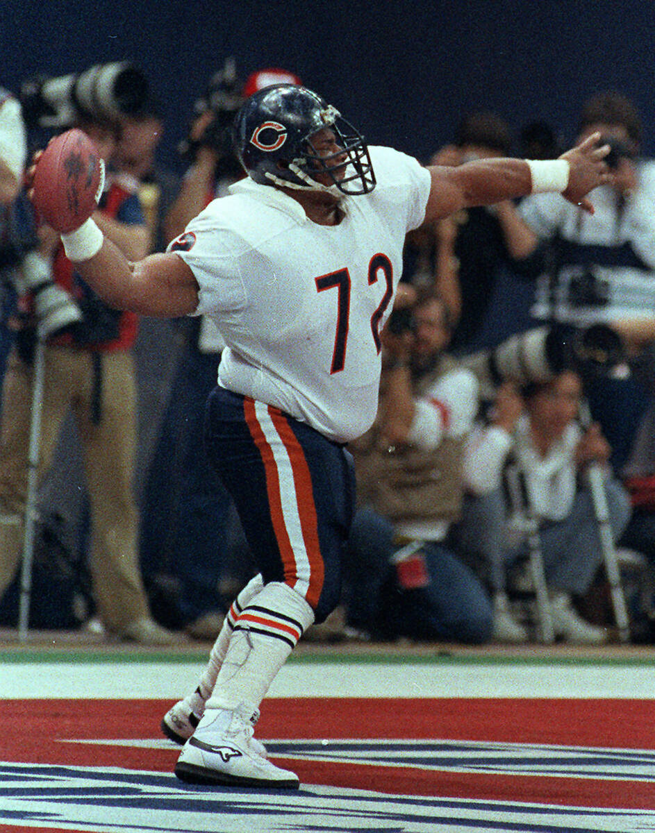 FILE - In this Jan. 26, 1986 file photo, Chicago Bears' William "The Refrigerator" Perry spikes ...
