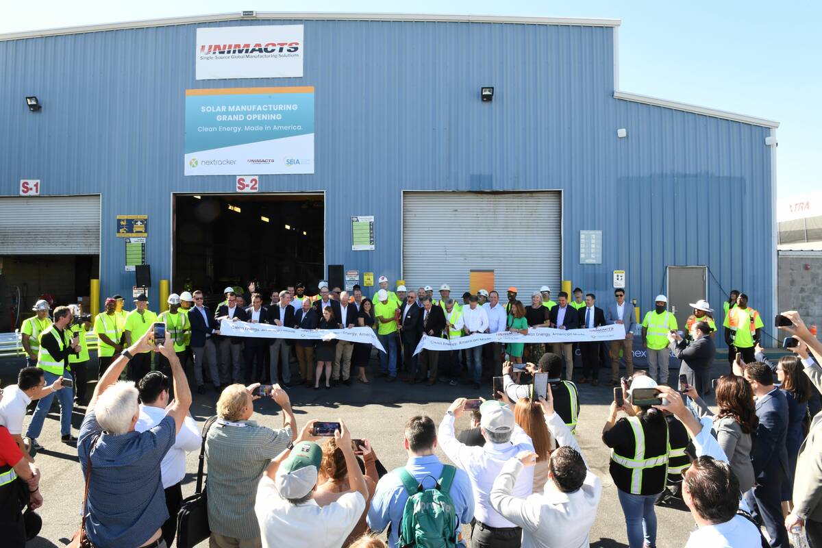 A ribbon cutting held for the expansion of Unimacts solar parts manufacturing facility in Las V ...