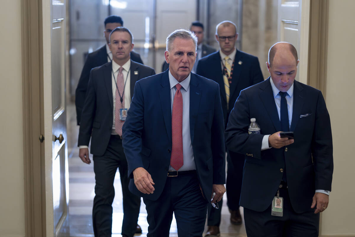 Speaker of the House Kevin McCarthy, R-Calif., arrives at the Capitol in Washington, early Tues ...