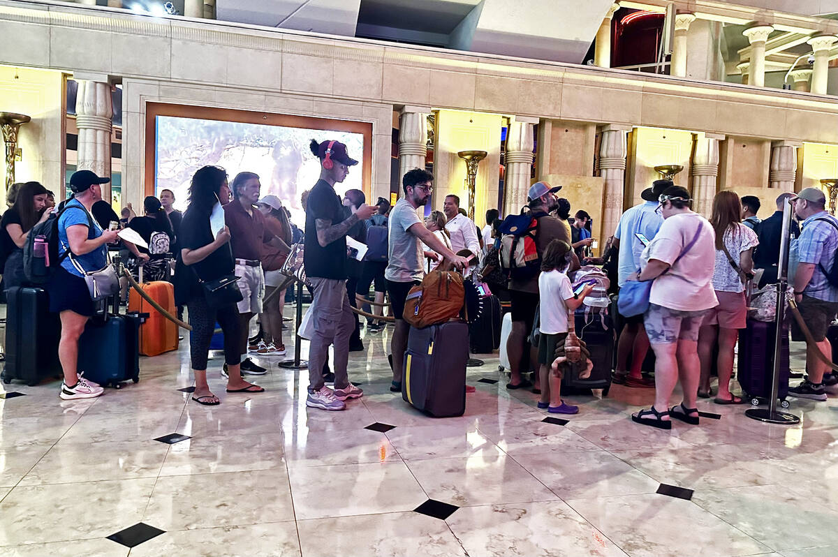 Long lines at the Luxor front desk as guests wait to check-in on Tuesday, Sept. 12, 2023. (L.E. ...