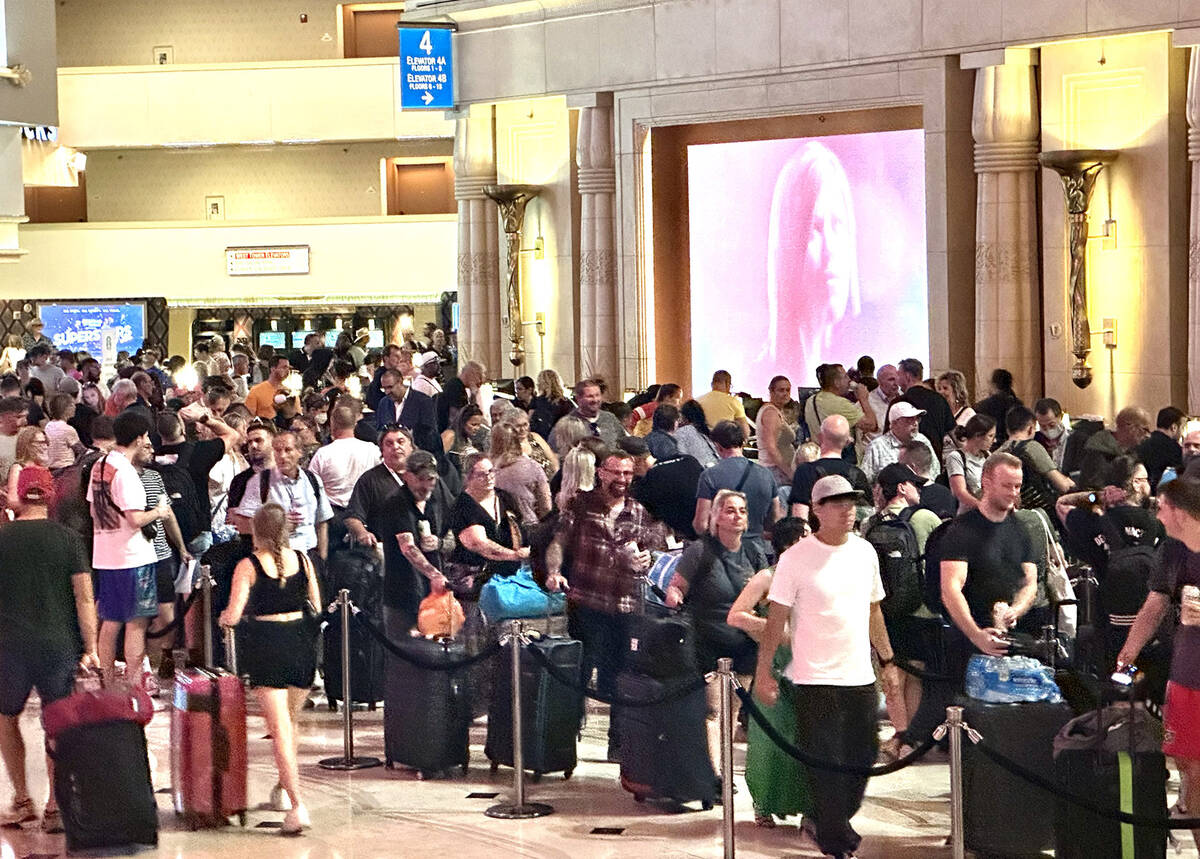 Long lines at the Luxor front desk as guests wait to check-in on Tuesday, Sept. 12, 2023. (L.E. ...