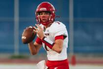 Arbor View quarterback Thaddeus Thatcher (7) looks to throw the ball to a teammate during a gam ...