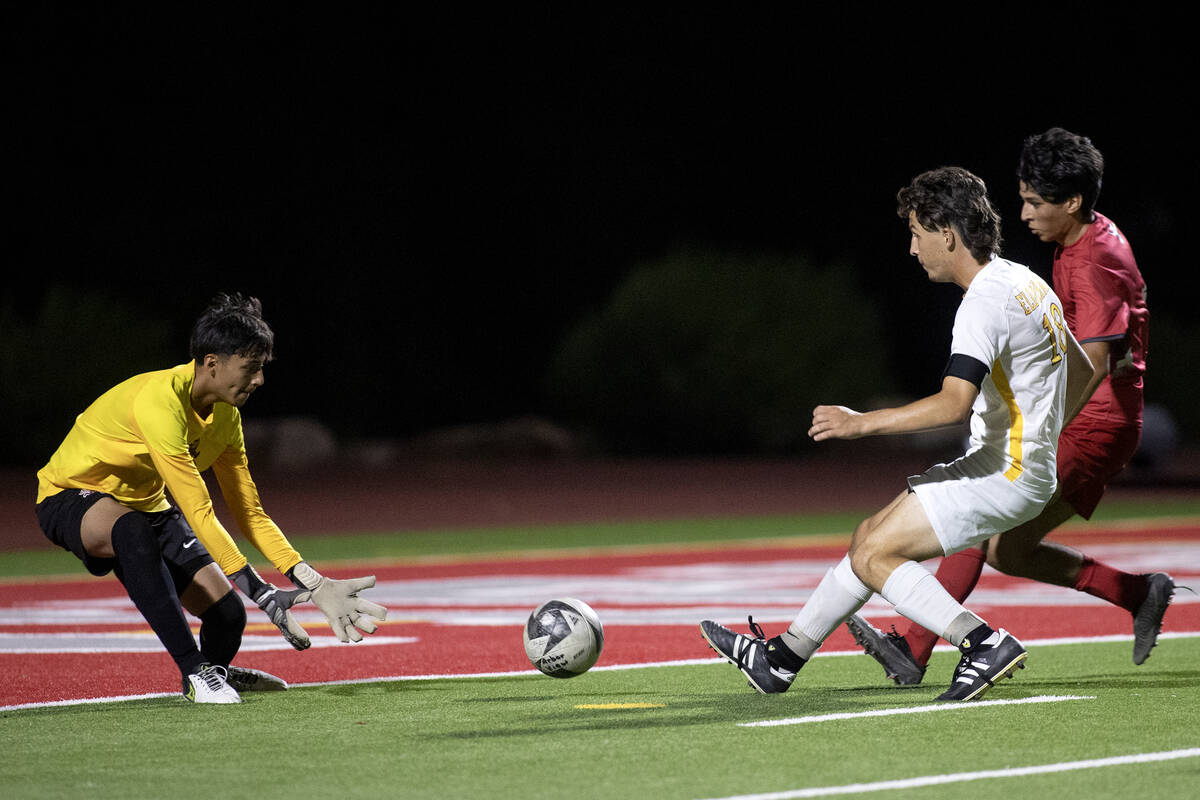 Eldorado goalkeeper Ryan Chavez (0) prepares to save an attempted against goal while Eldorado&# ...