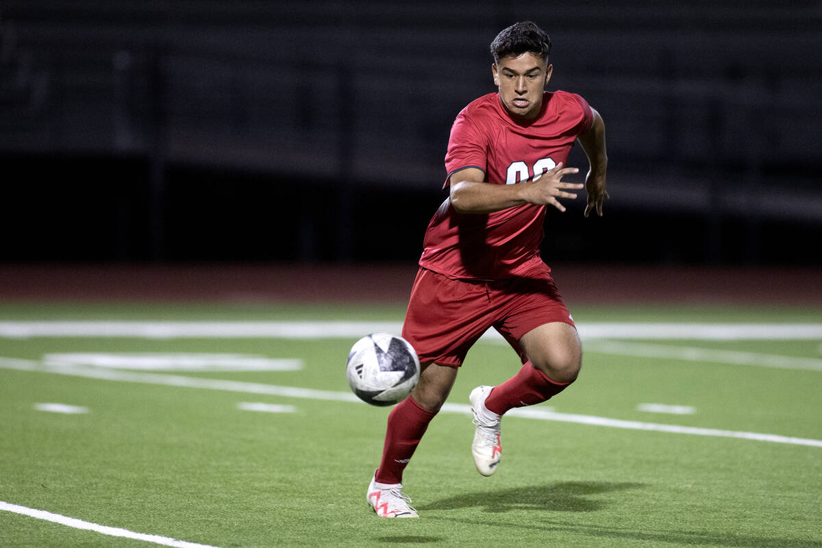 Arbor View's Parker Castillo (00) breaks away after the ball during a boys high school soccer g ...